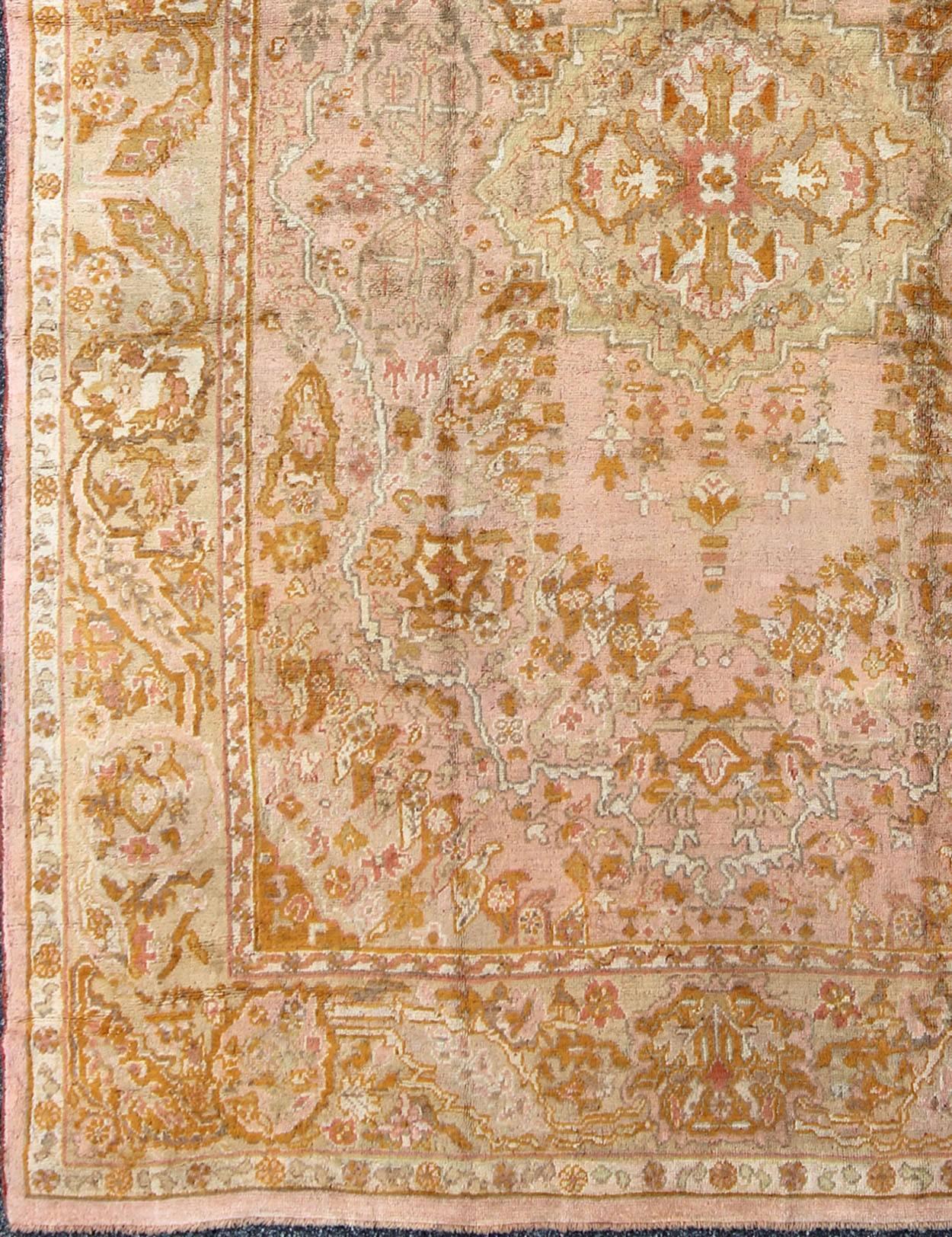 Antique Floral Pattern Oushak Rug. Keivan Woven Arts / rug /S12-0304, country of origin / type: Turkey / Oushak

Measures: 8'8 x 11'9

This elegant Antique Oushak from the early 20 century bears a stylized small center surrounded by flowers all over