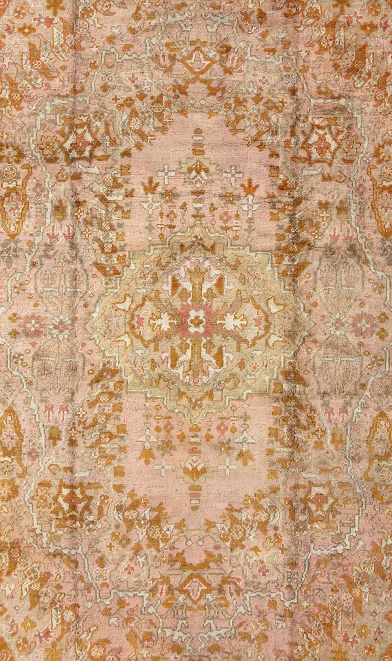Turkish Antique Oushak Rug with Floral Pattern in Pink, Orange and Light Green  For Sale