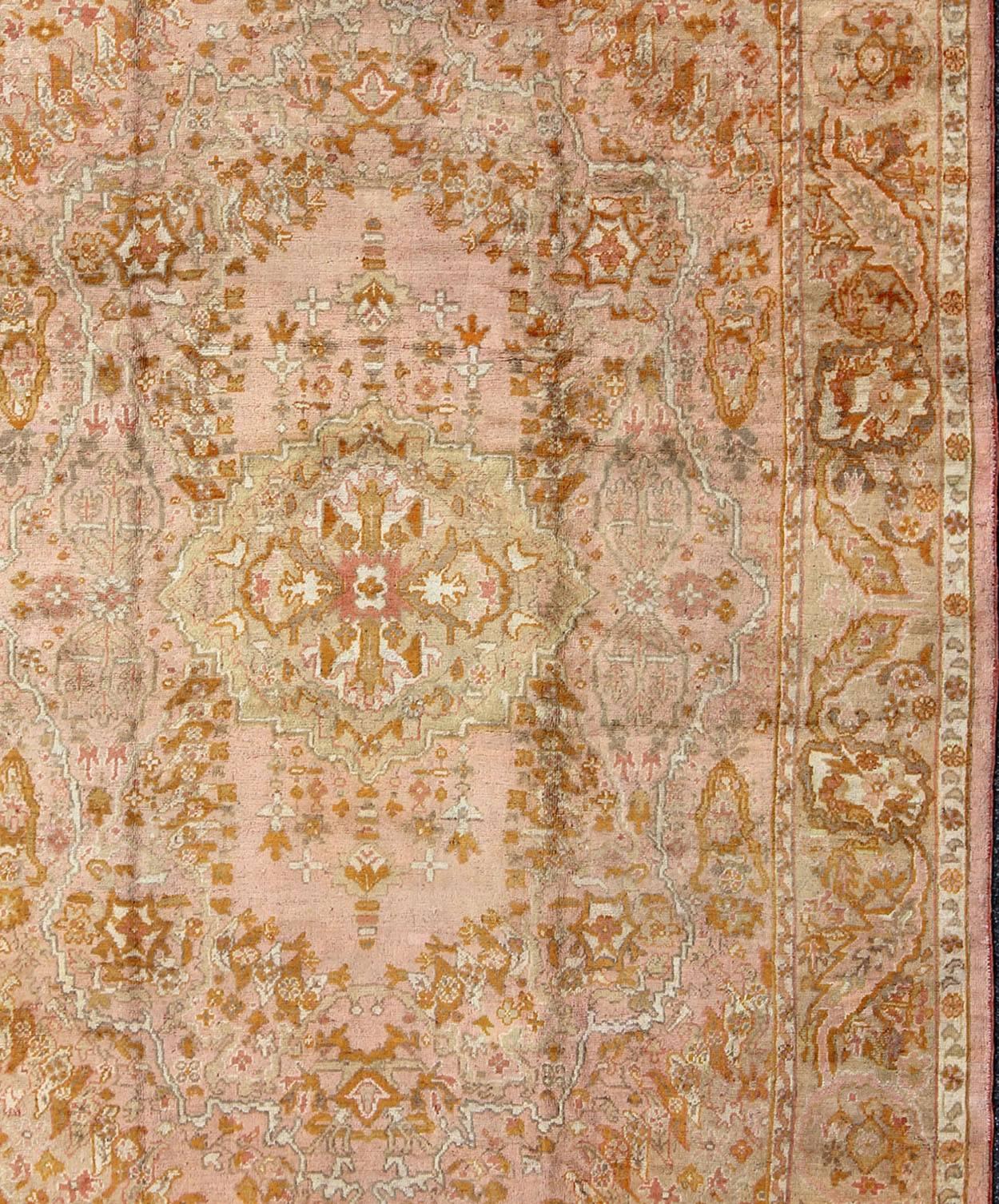 Hand-Knotted Antique Oushak Rug with Floral Pattern in Pink, Orange and Light Green  For Sale