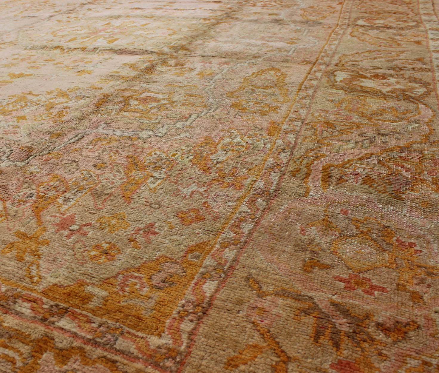 Antique Oushak Rug with Floral Pattern in Pink, Orange and Light Green  In Excellent Condition For Sale In Atlanta, GA