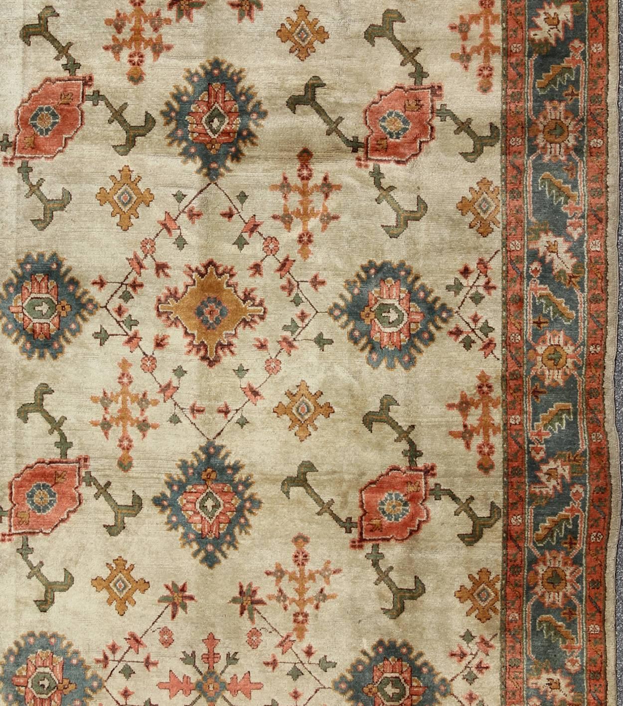 Antique Turkish Oushak Rug With All Over Design in Teal, Cream & Coral In Excellent Condition In Atlanta, GA
