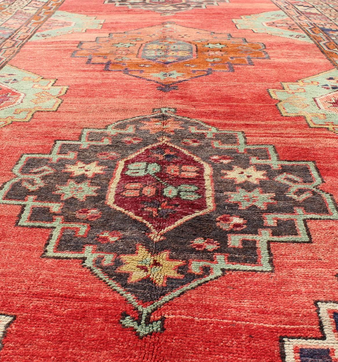 Mid-20th Century Red Field Vintage Turkish Oushak Wide Runner with Geometric Design For Sale