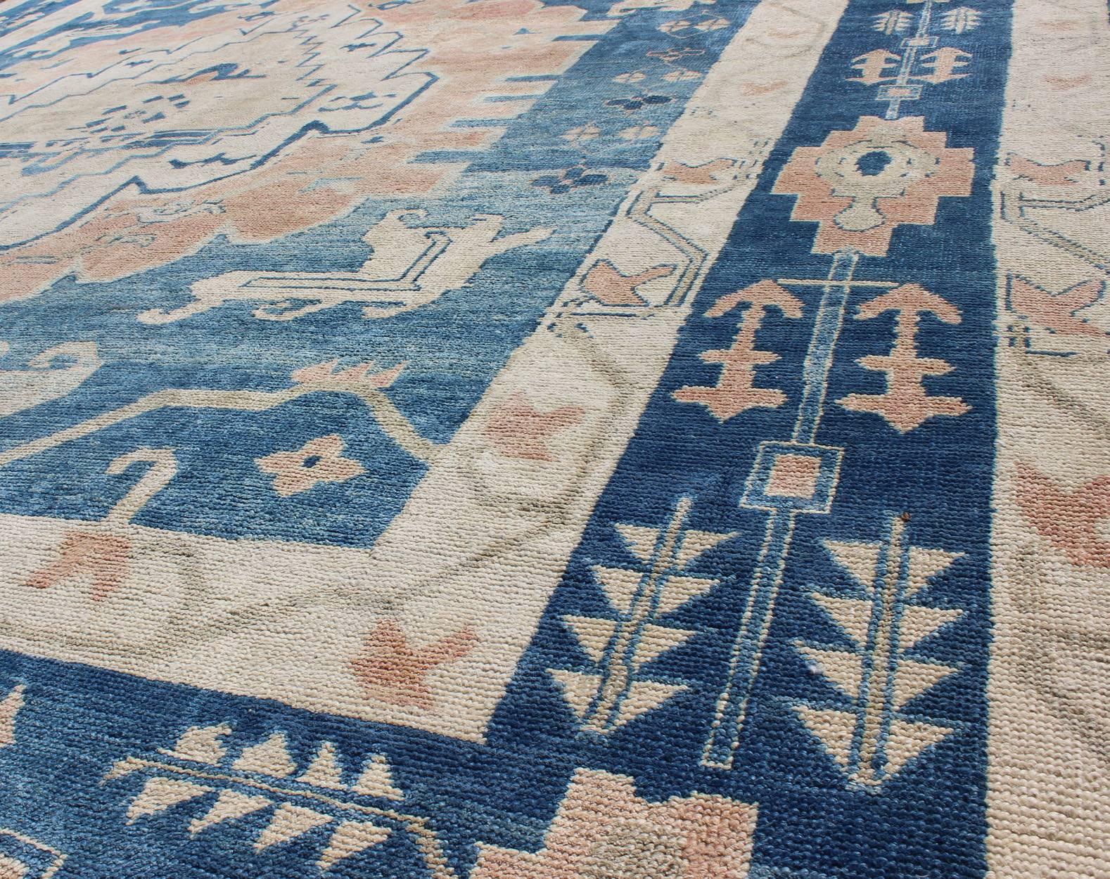 pink and blue turkish rug
