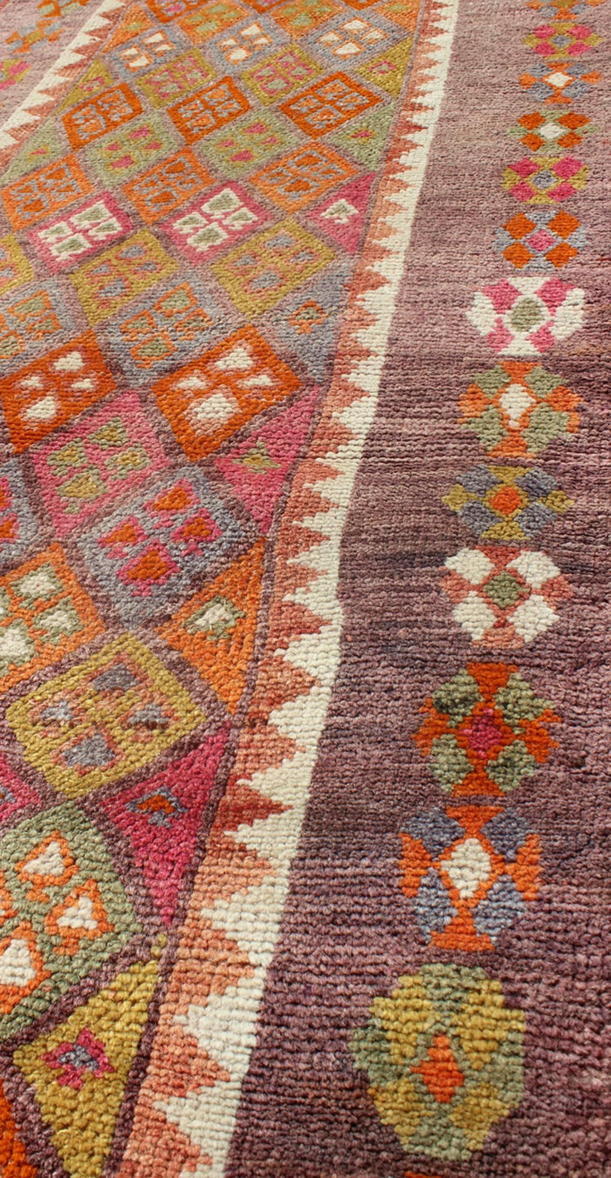 Mid-20th Century Colorful Vintage Turkish Oushak Runner with Repeating Diamond Geometric Design For Sale