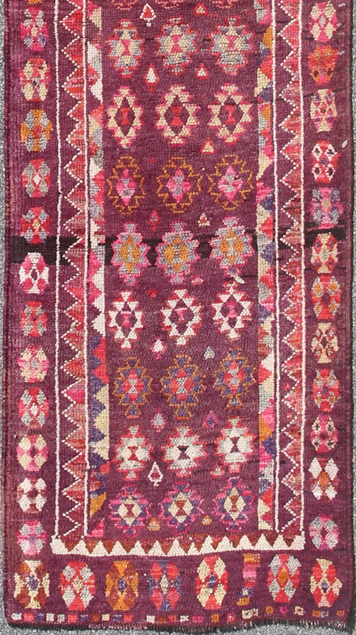  colorful vintage Turkish Oushak runner with geometric design, rug en-165655, country of origin / type: Turkey / Oushak, circa 1950

This vintage Oushak runner (circa mid-20th century) features a unique blend of colors and an intricately beautiful