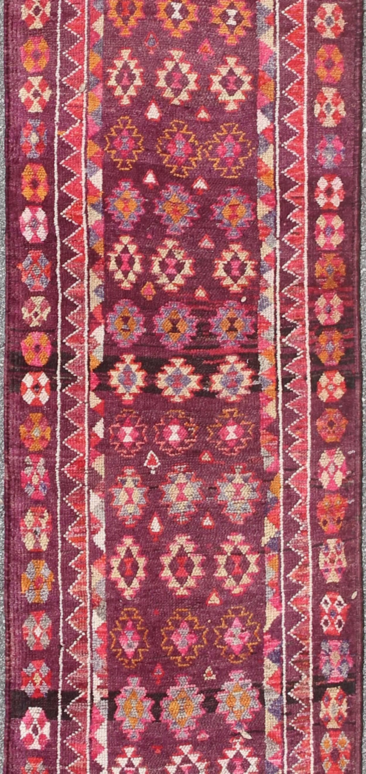 Hand-Knotted Colorful vintage Turkish Oushak Long runner in Purple & Plum background For Sale