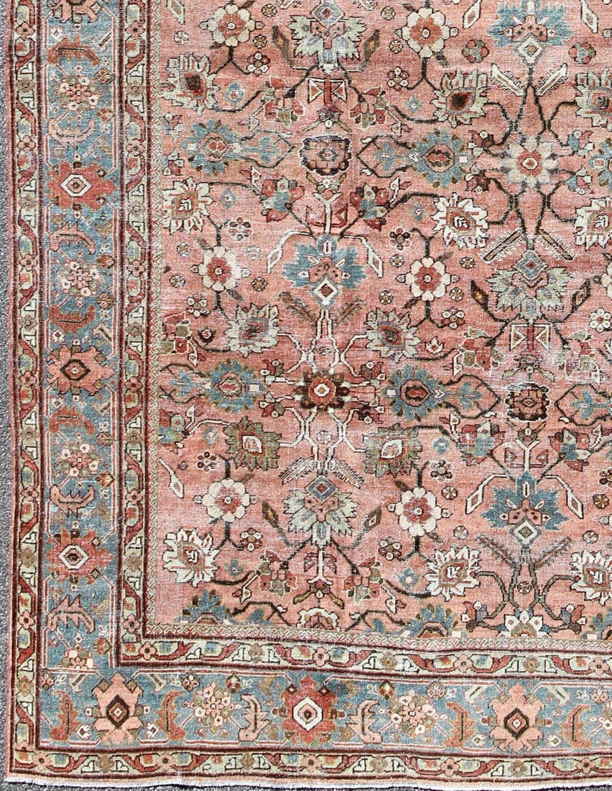 Antique sub-geometric Persian distressed Sultanabad rug with burnt orange field, blue Border, rug gld-4777, country of origin / type: Iran / Sultanabad, circa 1910

This beautiful and large early 20th century antique Persian Sultanabad rug