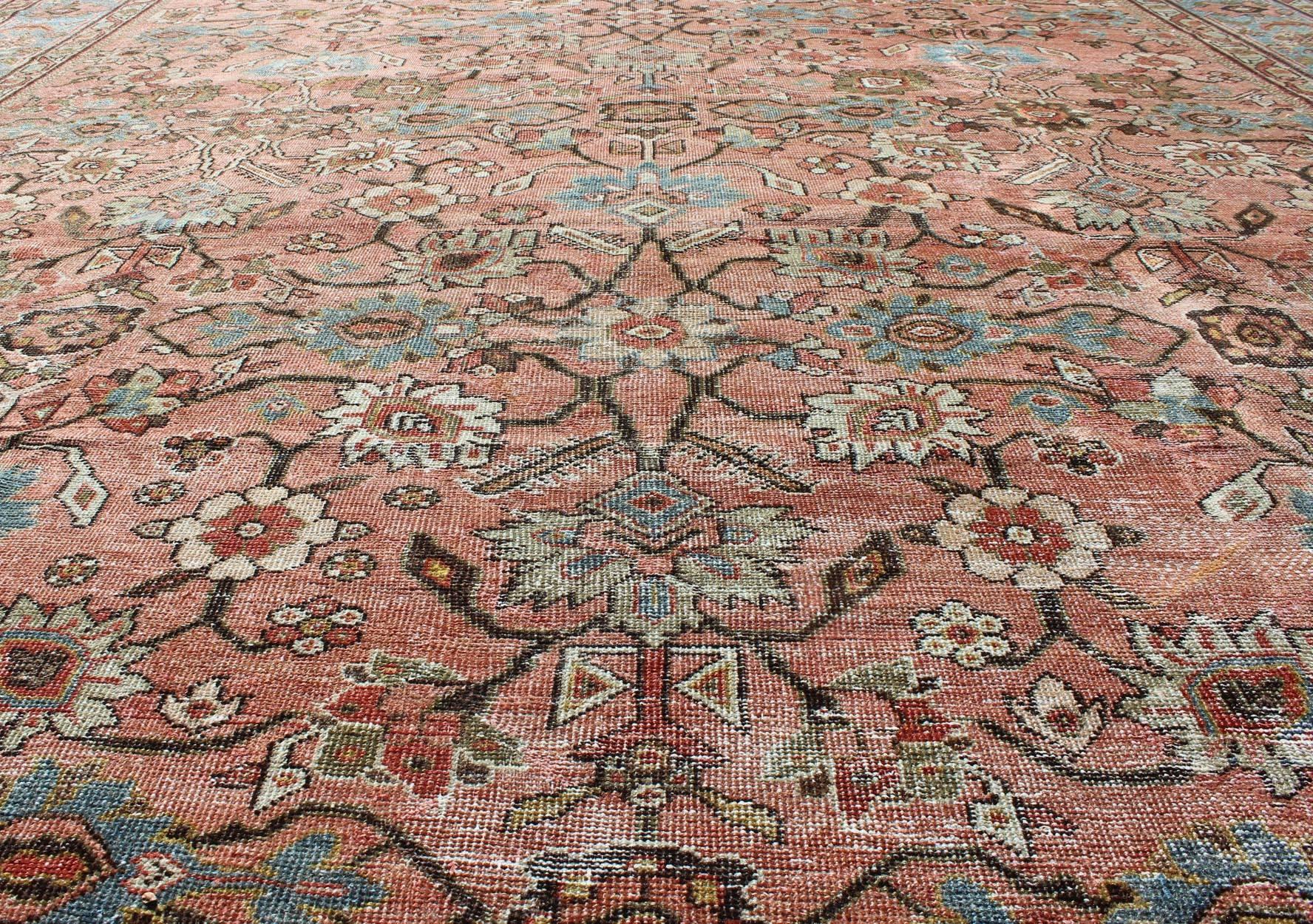 Early 20th Century Antique Distressed Persian Sultanabad Rug with Burnt Orange Field, Blue Border For Sale