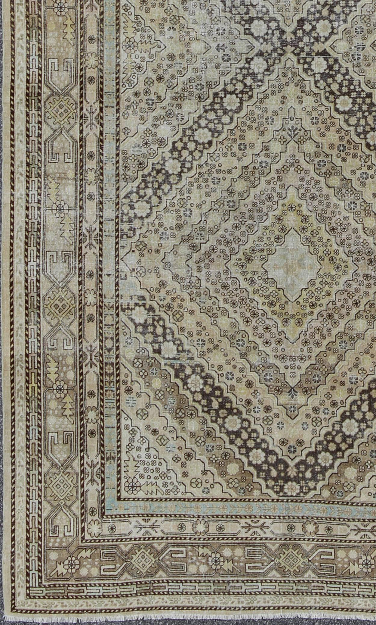 Antique Turkestanian Khotan rug with paired diamond geometric medallions, rug gld-8495, country of origin / type: East Turkestan / Khotan, circa 1910.

This delicately rendered antique Khotan rug was handcrafted in Turkestan during the early part