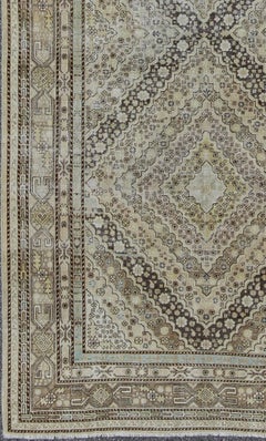 Antique Turkestanian Khotan Rug with Paired Diamond Geometric Medallions