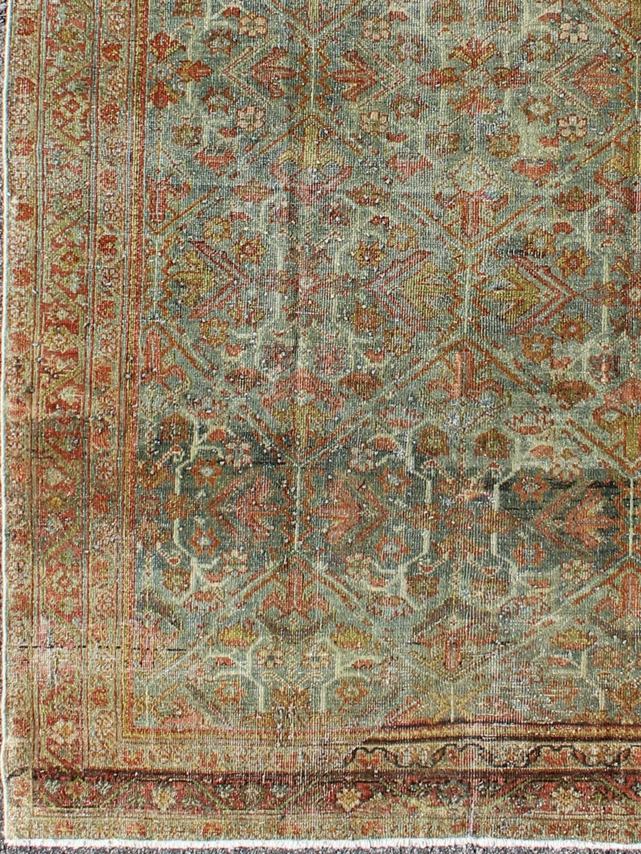 Antique Persian Mahal rug with flowing floral pattern in gray, red, acid yellow, rug gld-8797, country of origin / type: Iran / Sultanabad, circa 1920s

This antique Persian Sultanabad Mahal rug, circa 1920s relies heavily on exquisite details as