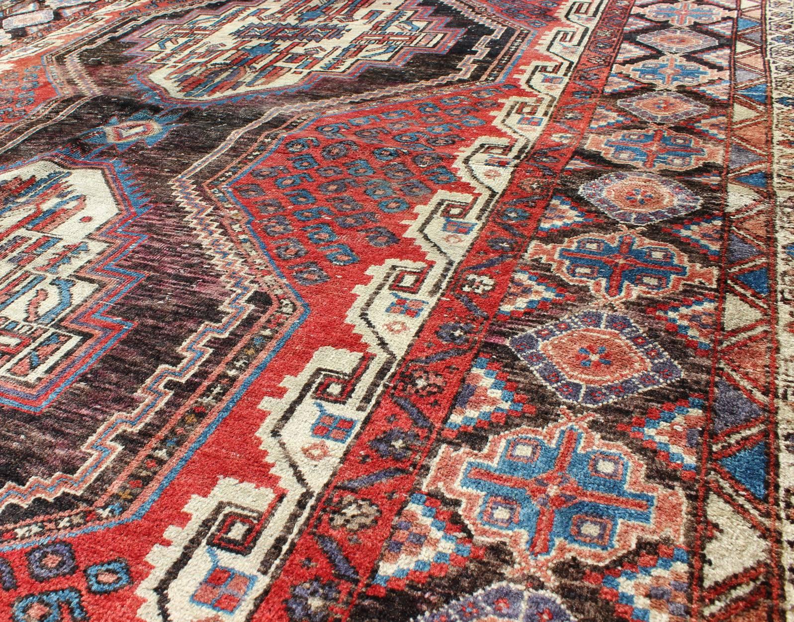 Dual Medallion Vintage Persian Seejan Rug in Red, Charcoal, Blue, and Brown In Excellent Condition In Atlanta, GA