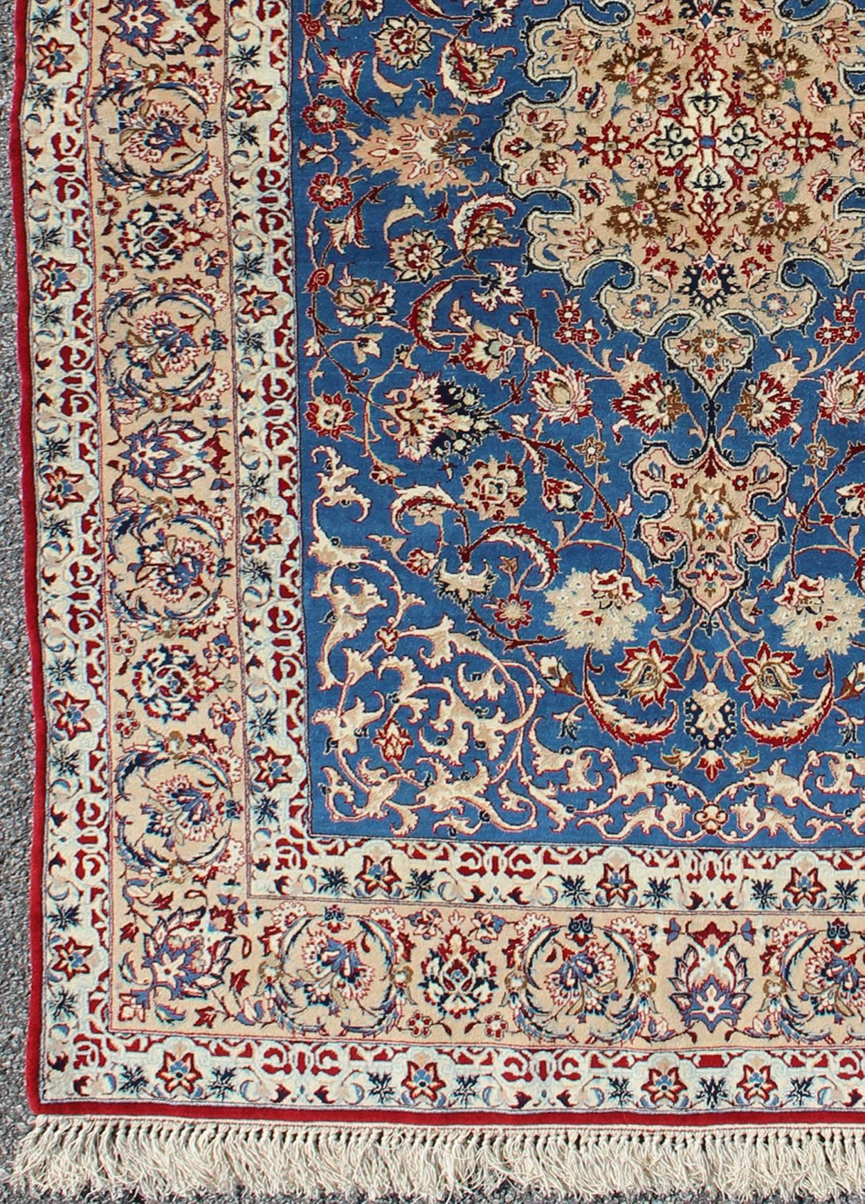 Blue Persian very fine Isfahan carpet with intricate and detailed floral elements, rug j10-0607, country of origin / type: Iran / Isfahan, circa 1950

Measures: 3'7 x 5'11.

This outstanding vintage Persian Isfahan carpet is primarily characterized