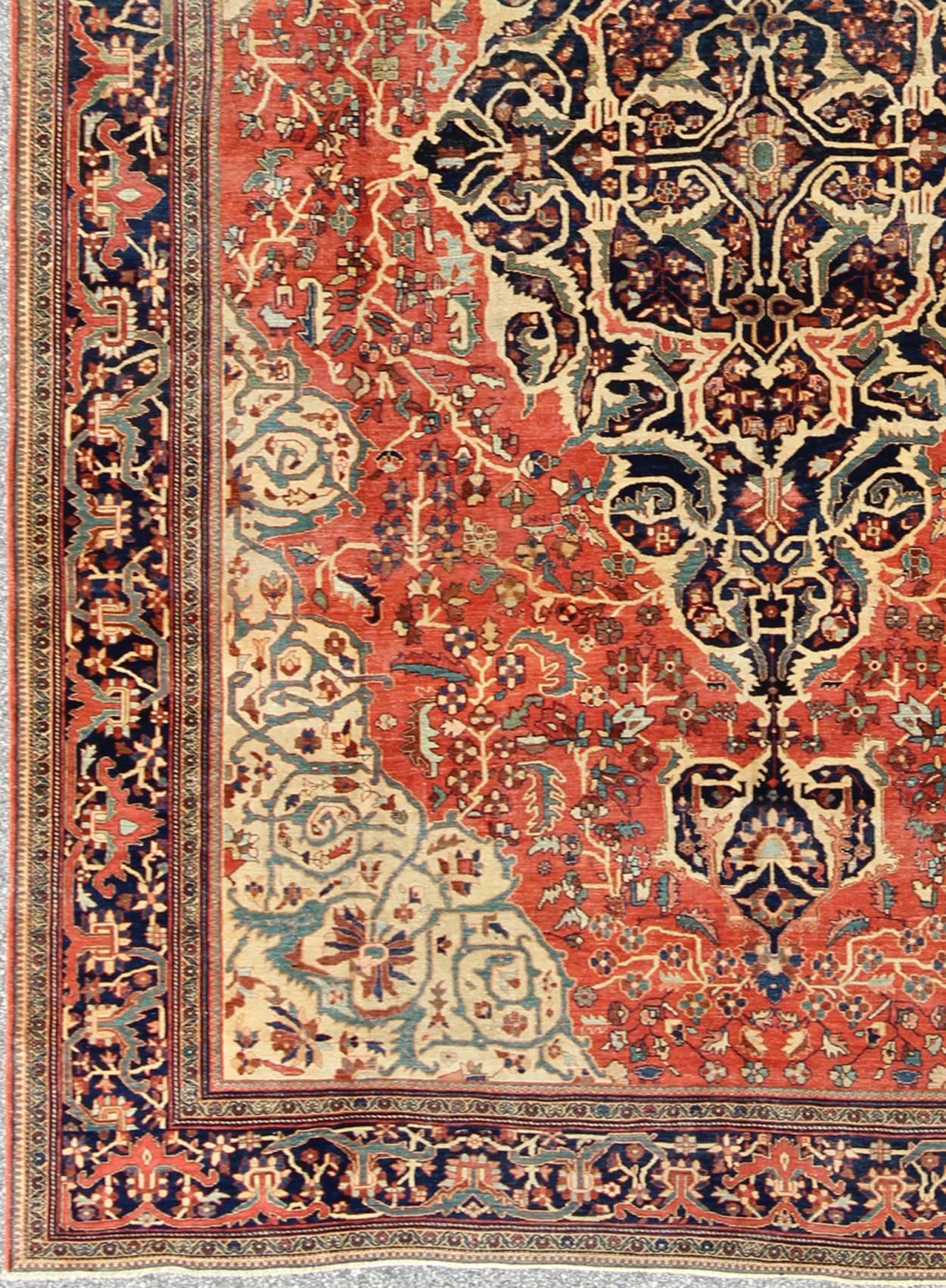 Multi-layered medallion antique Persian Sarouk-Ferahan rug in red and blue, rug m14-0402, country of origin / type: Iran / Sarouk-Ferahan, circa 1880

This fine Ferahan-Sarouk carpet form the late 19th century boasts an impressive multi-layered