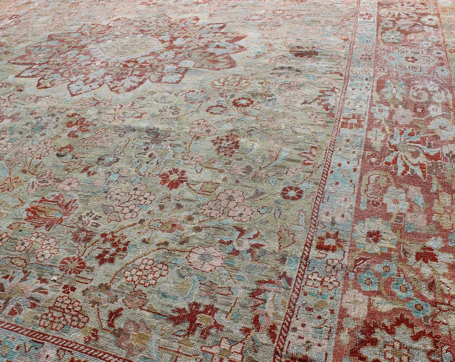 Early 20th Century Antique Persian Sultanabad with Floral Design in Coral Pink and Light Green For Sale
