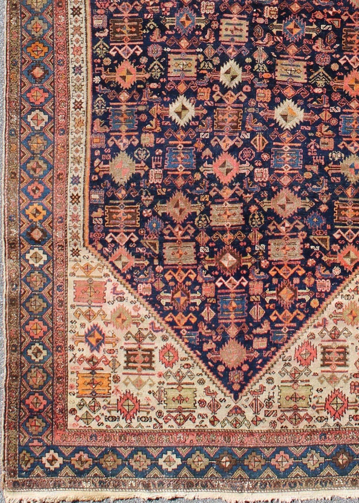 Navy blue antique Persian Malayer antique rug with all-over sub-geometric design, rug tra-170901, country of origin / type: Iran / Malayer, circa 1910

This antique Persian Malayer runner from early 20th century Iran (circa 1910) features an