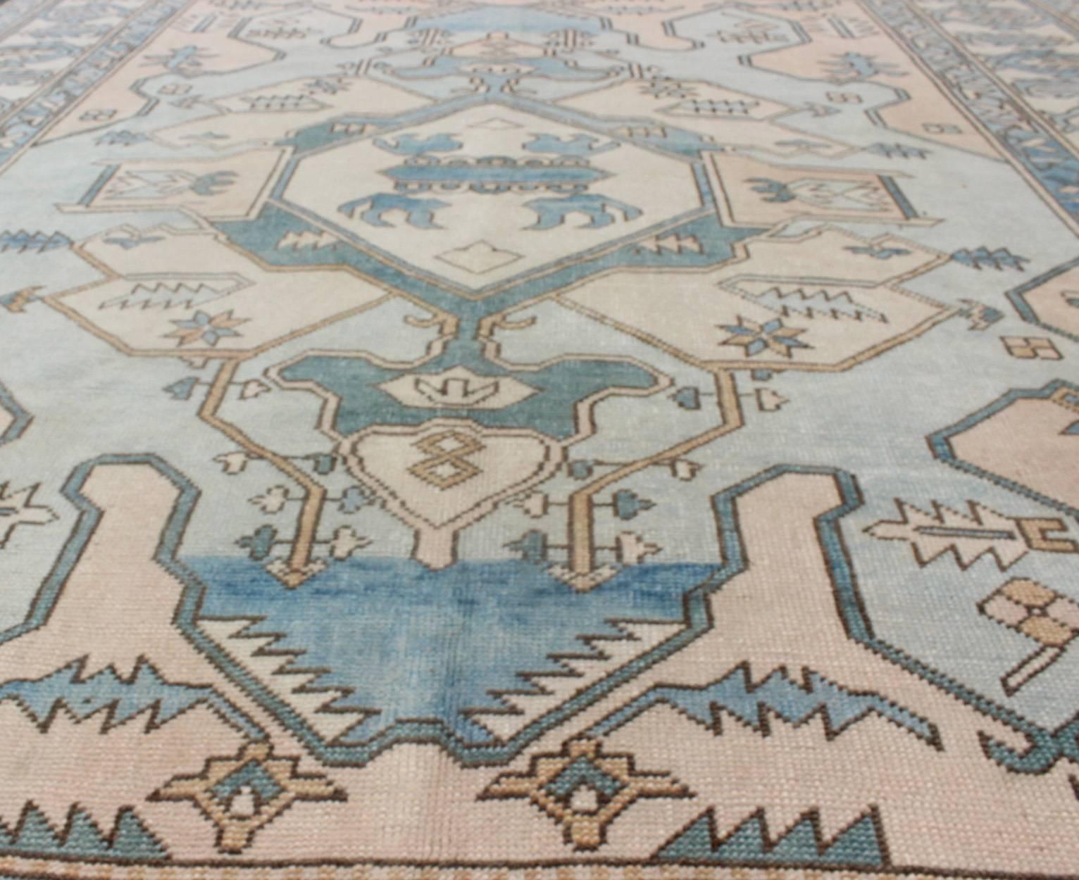 Mid-20th Century Vintage Oushak Rug from Turkey with Medallion in Shades of Blue, Cream and Nude
