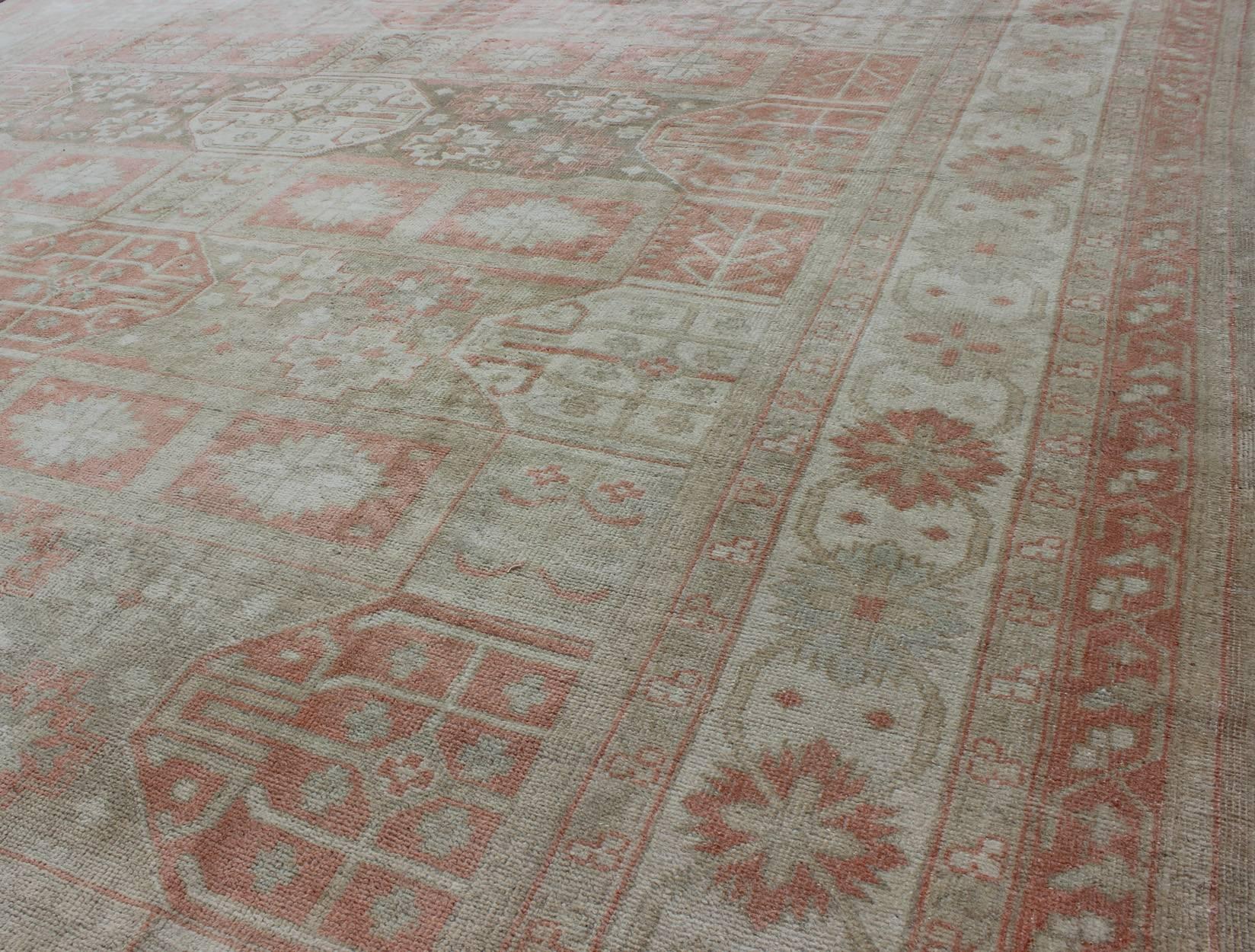 Vintage Khotan Design Rug with Sub-Geometric Grid Design and Detailed Borders In Excellent Condition For Sale In Atlanta, GA