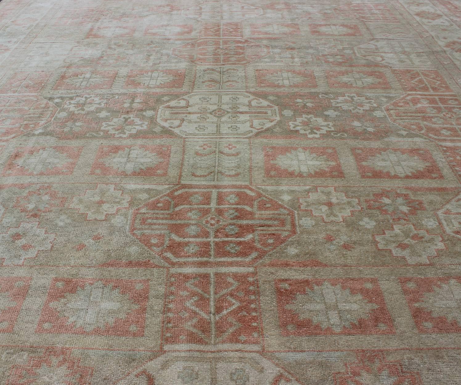 Mid-20th Century Vintage Khotan Design Rug with Sub-Geometric Grid Design and Detailed Borders For Sale