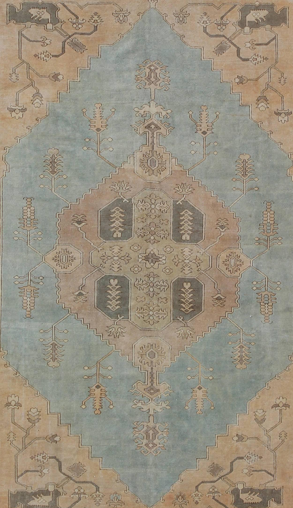 Hand-Knotted Vintage Turkish Oushak Rug with Vining Florals in Light Blue, Light Brown & Tan For Sale