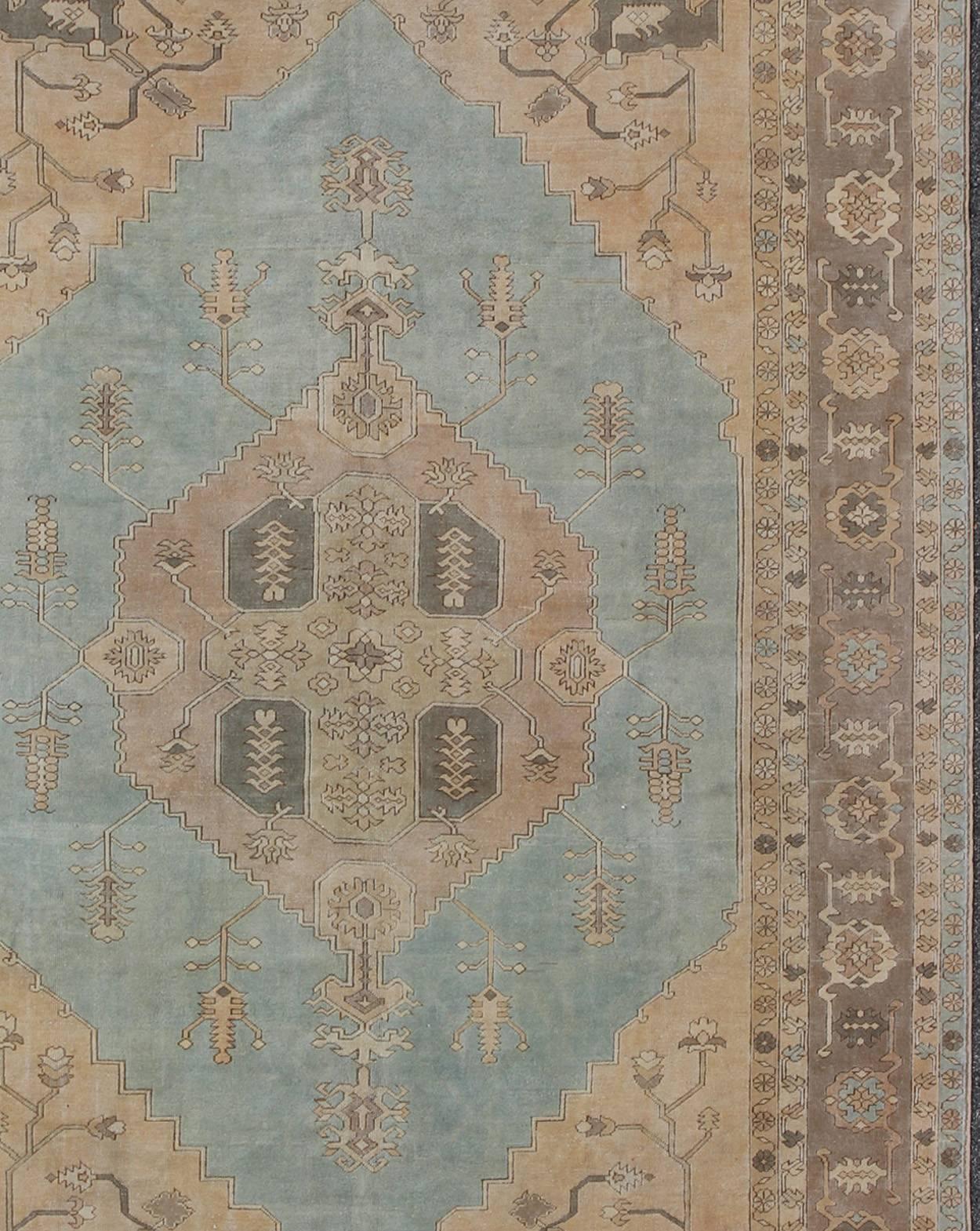 Vintage Turkish Oushak Rug with Vining Florals in Light Blue, Light Brown & Tan In Excellent Condition For Sale In Atlanta, GA