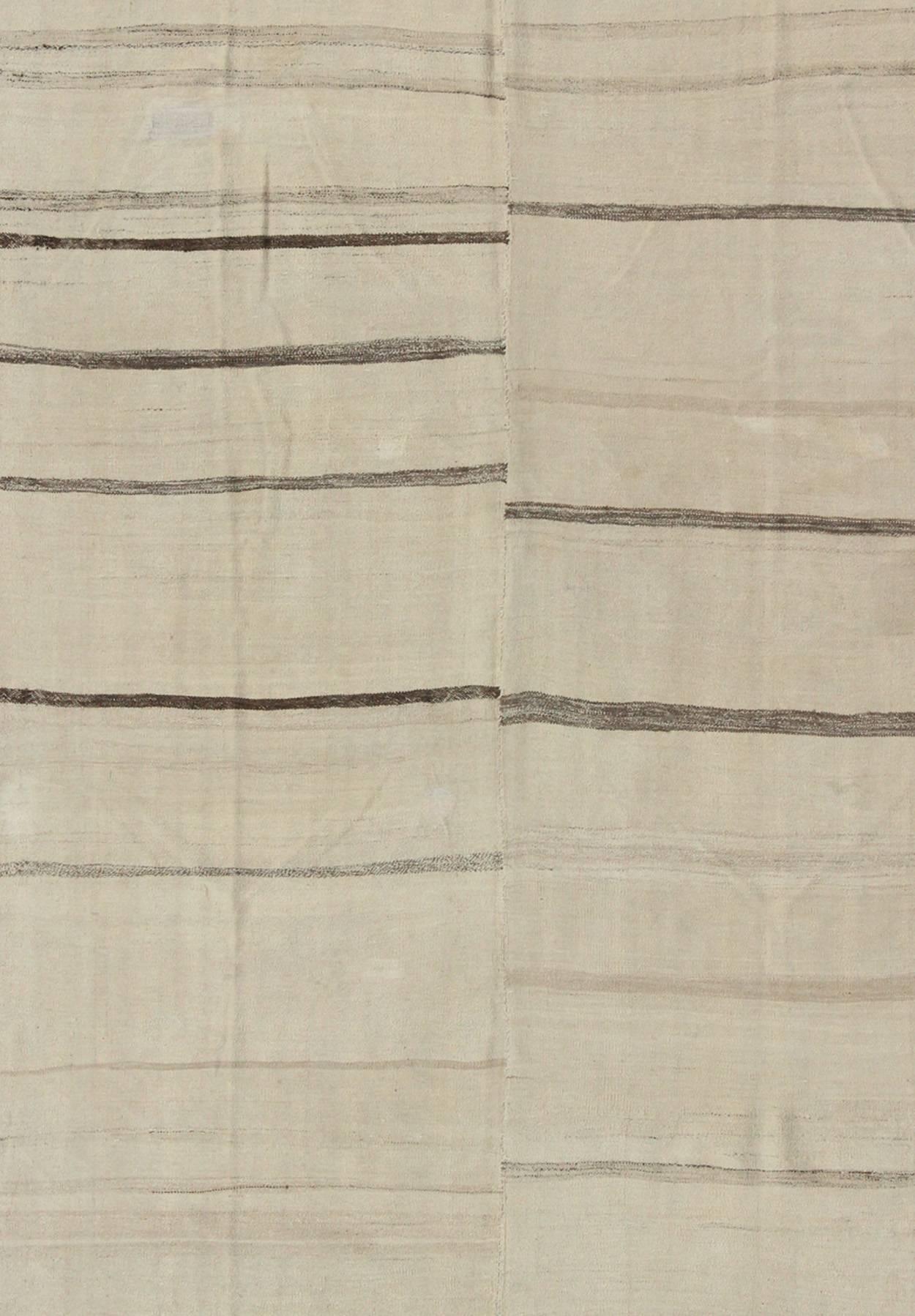 brown and cream striped rug