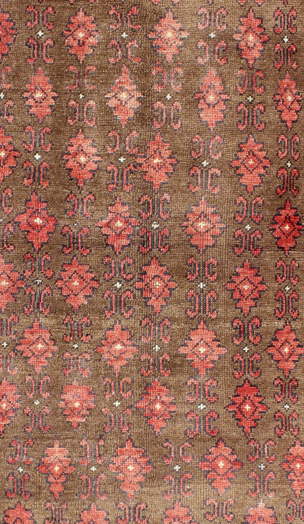 Hand-Knotted Red and Brown Vintage Turkish Oushak Rug with Repeating Vertical Motif Design For Sale
