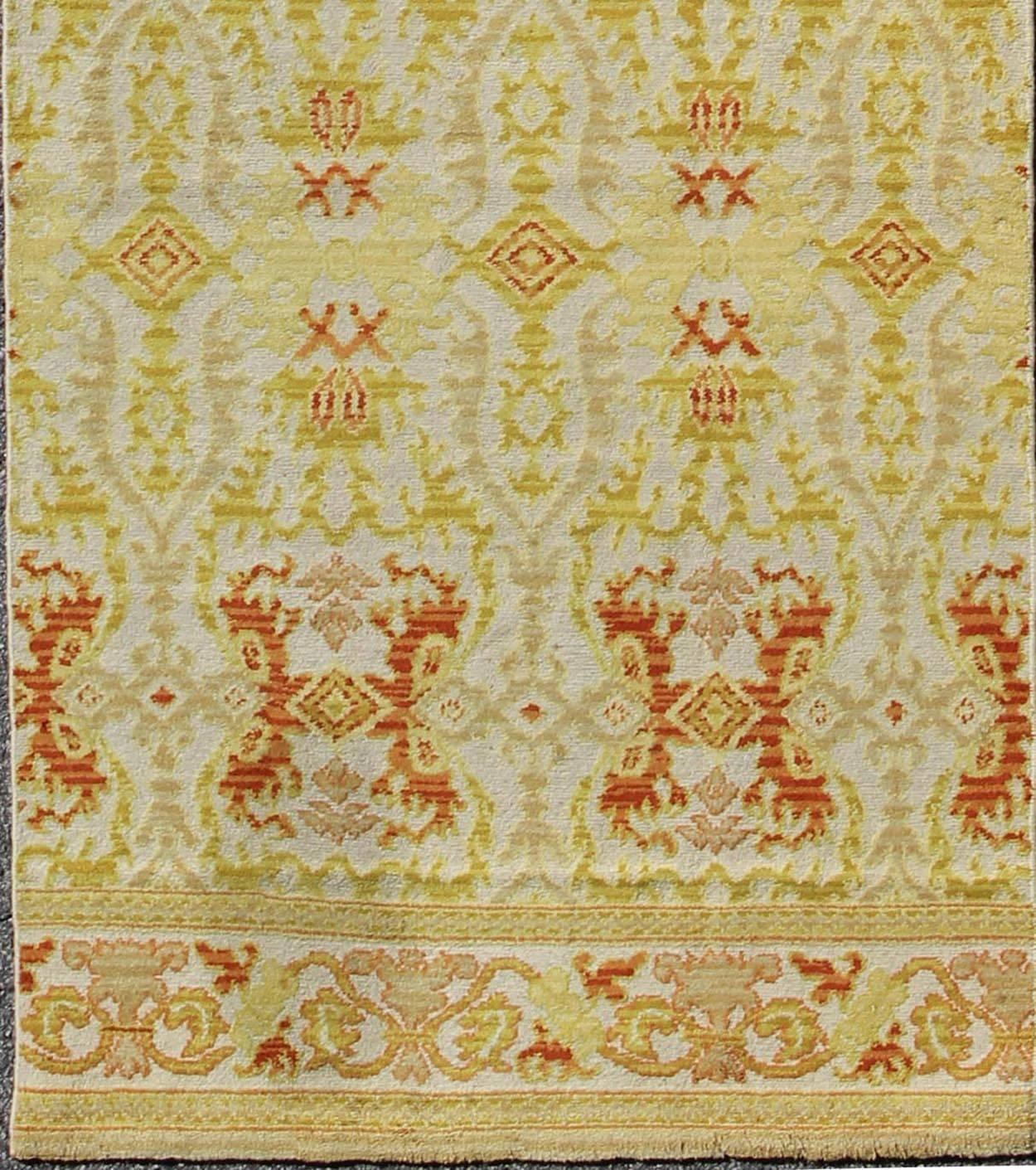 Green, yellow, orange antique Spanish runner feat. in Atlanta homes and lifestyles, rug B-0304-A, country of origin / type: Spain / Spanish, circa 1920

Measures: 3'10 x 14'

This stunning antique Spanish runner fragment bears a lovely repeating