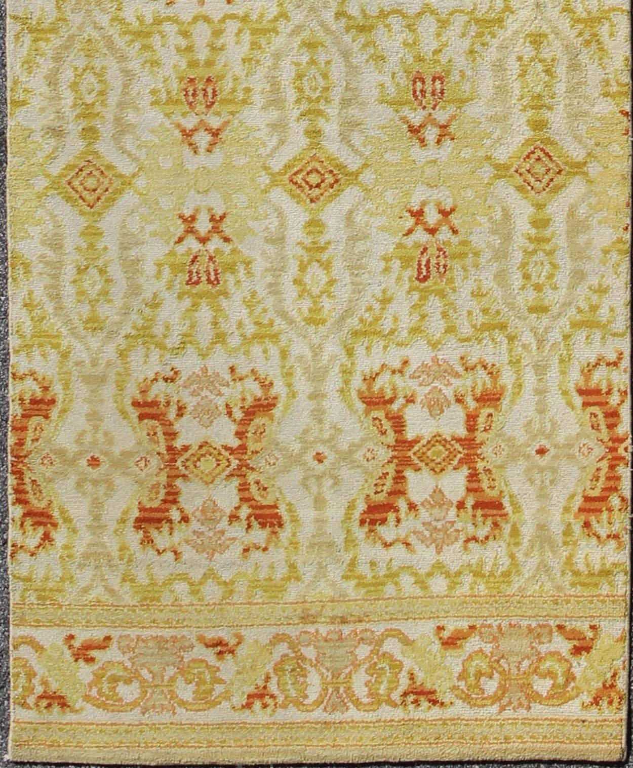 Green, yellow, orange antique Spanish runner feat. in Atlanta homes and lifestyles, rug B-0304-B, country of origin / type: Spain / Spanish, circa 1920

Measures: 3'10 x 14'

This stunning antique Spanish runner fragment bears a lovely repeating