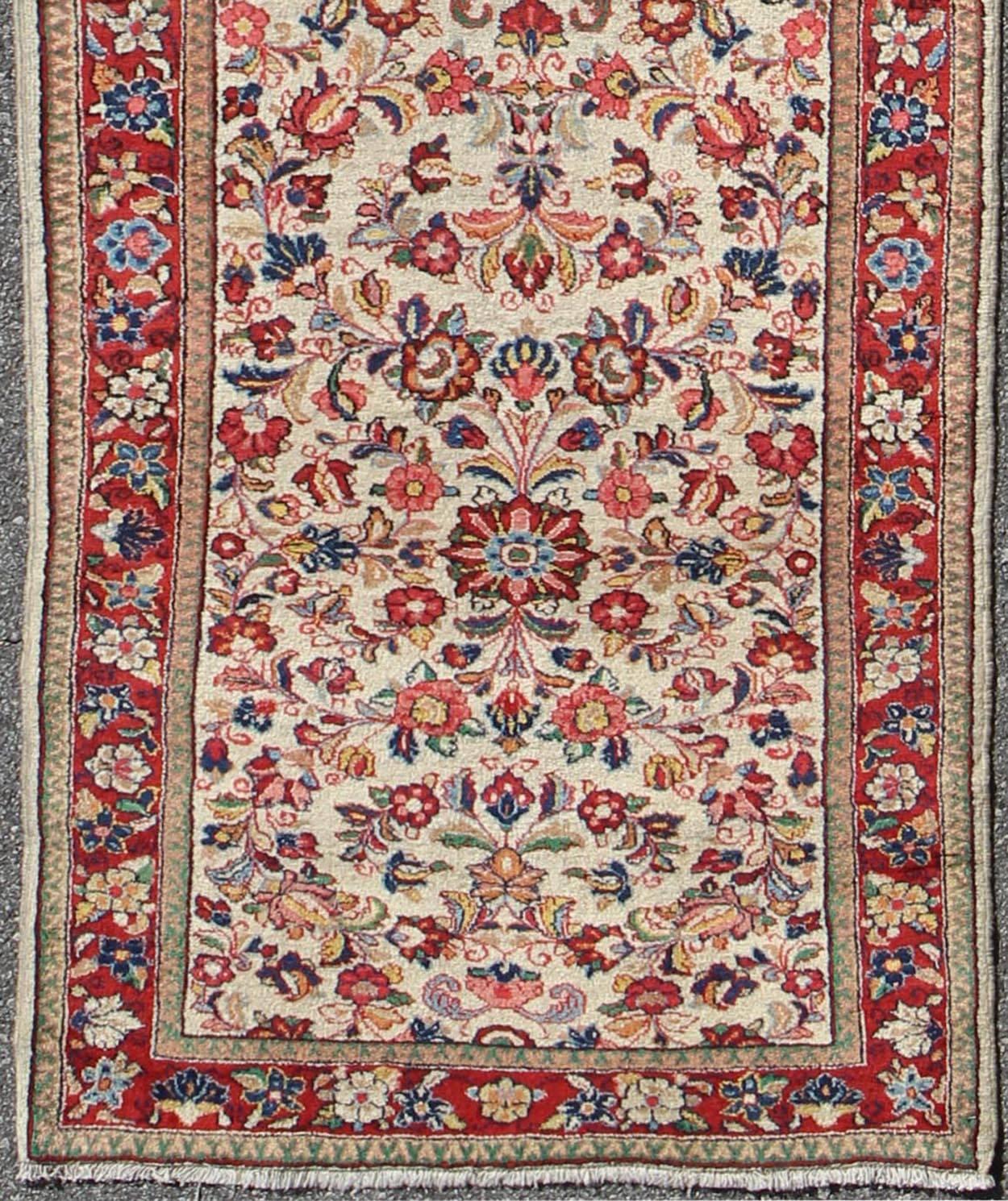 Antique Persian Sarouk rug all-over floral design in rich red and ivory, rug/DSP-CA4448, country of origin / type: Iran / Sarouk, circa 1930

This immaculately woven 1930's Ivory Sarouk rug represents the best in the world of Persian weaving. A