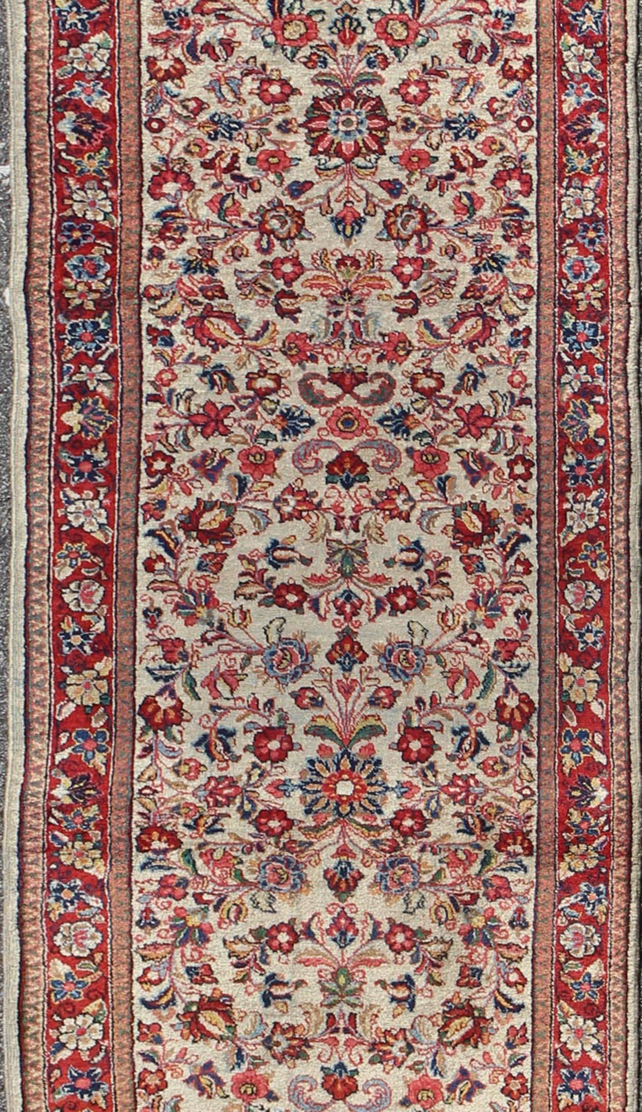 Sarouk Farahan Antique Persian Sarouk Rug with All-Over Floral Design in Rich Red and Ivory For Sale
