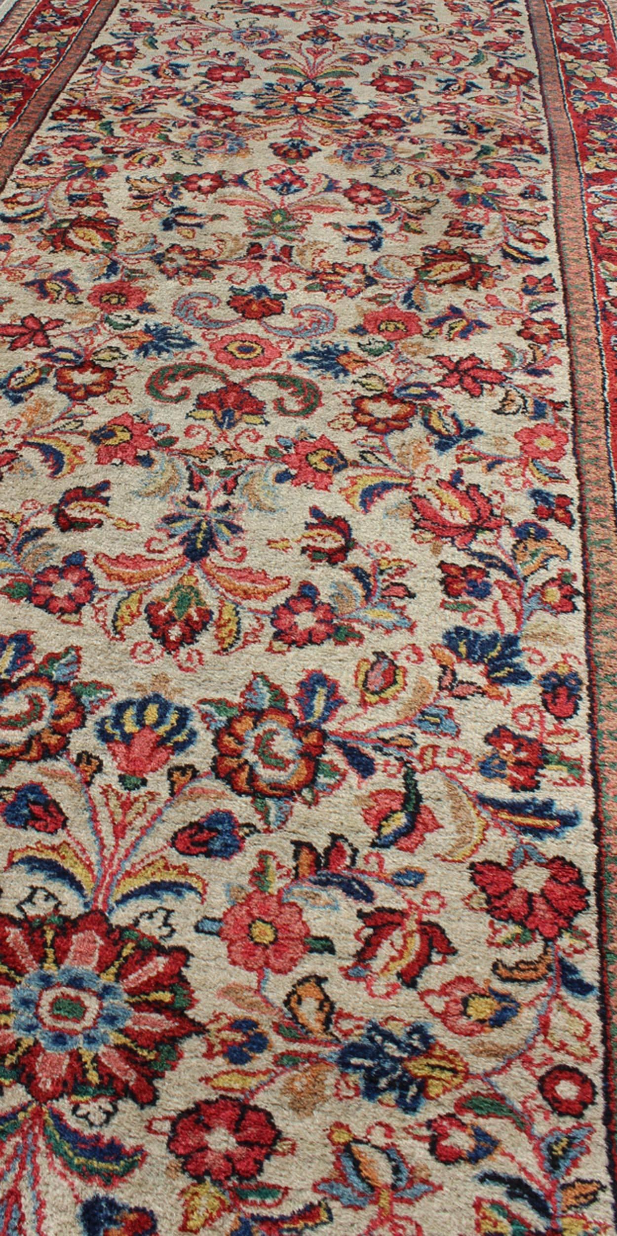 Hand-Knotted Antique Persian Sarouk Rug with All-Over Floral Design in Rich Red and Ivory For Sale