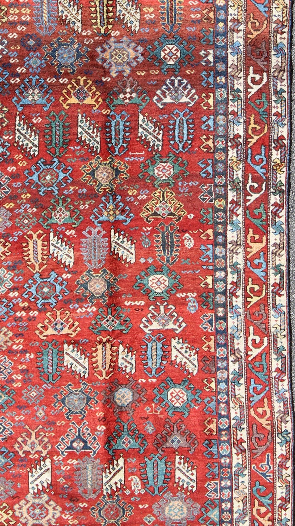 Tribal Antique Qashqai Persian Rug with All-Over Sub-Geometric Design and Tiered Border For Sale