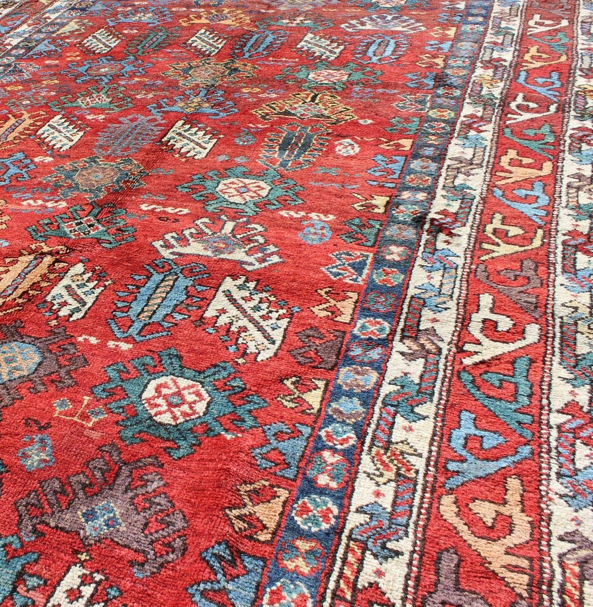 Hand-Knotted Antique Qashqai Persian Rug with All-Over Sub-Geometric Design and Tiered Border For Sale