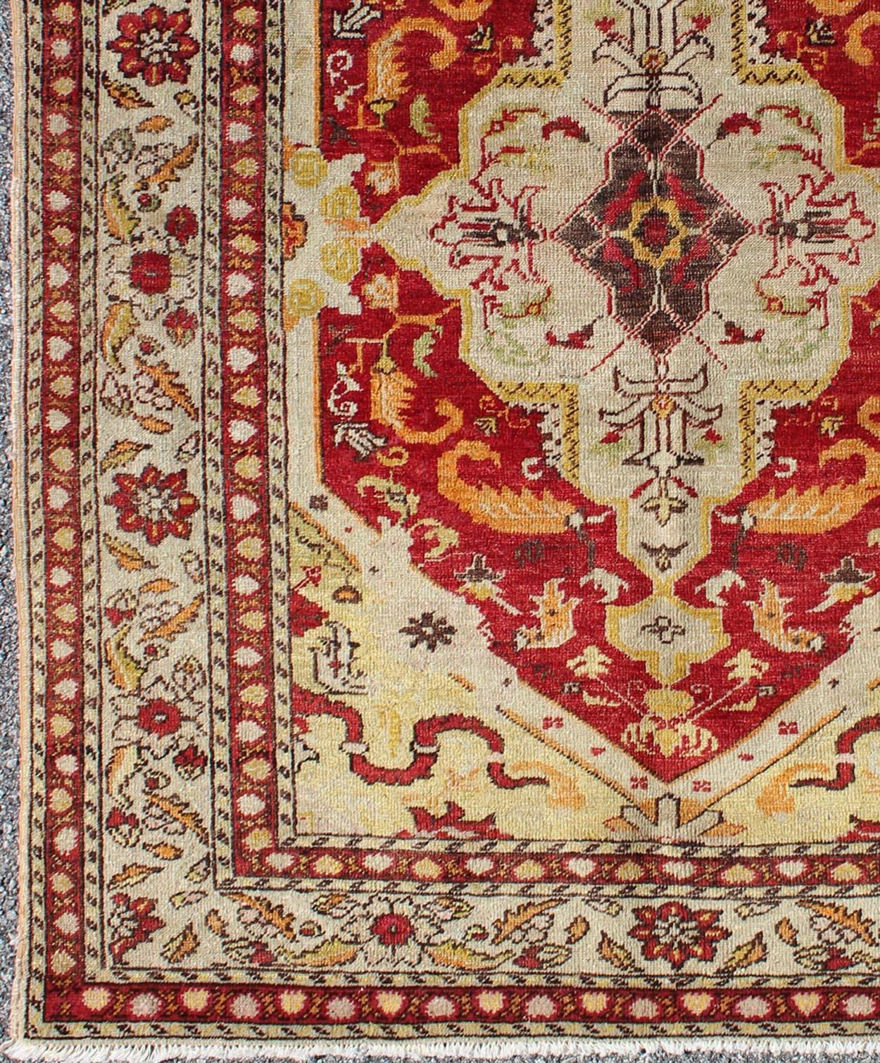 Antique Turkish Fine Sivas rug with center  medallion in Red, yellow & Light Green. Keivan Woven Arts/ rug E-1101, country of origin / type: Turkey / Oushak, circa 1910

Measures: 3'10 x 5'1.

This antique early 20th century Sivas fine rug features