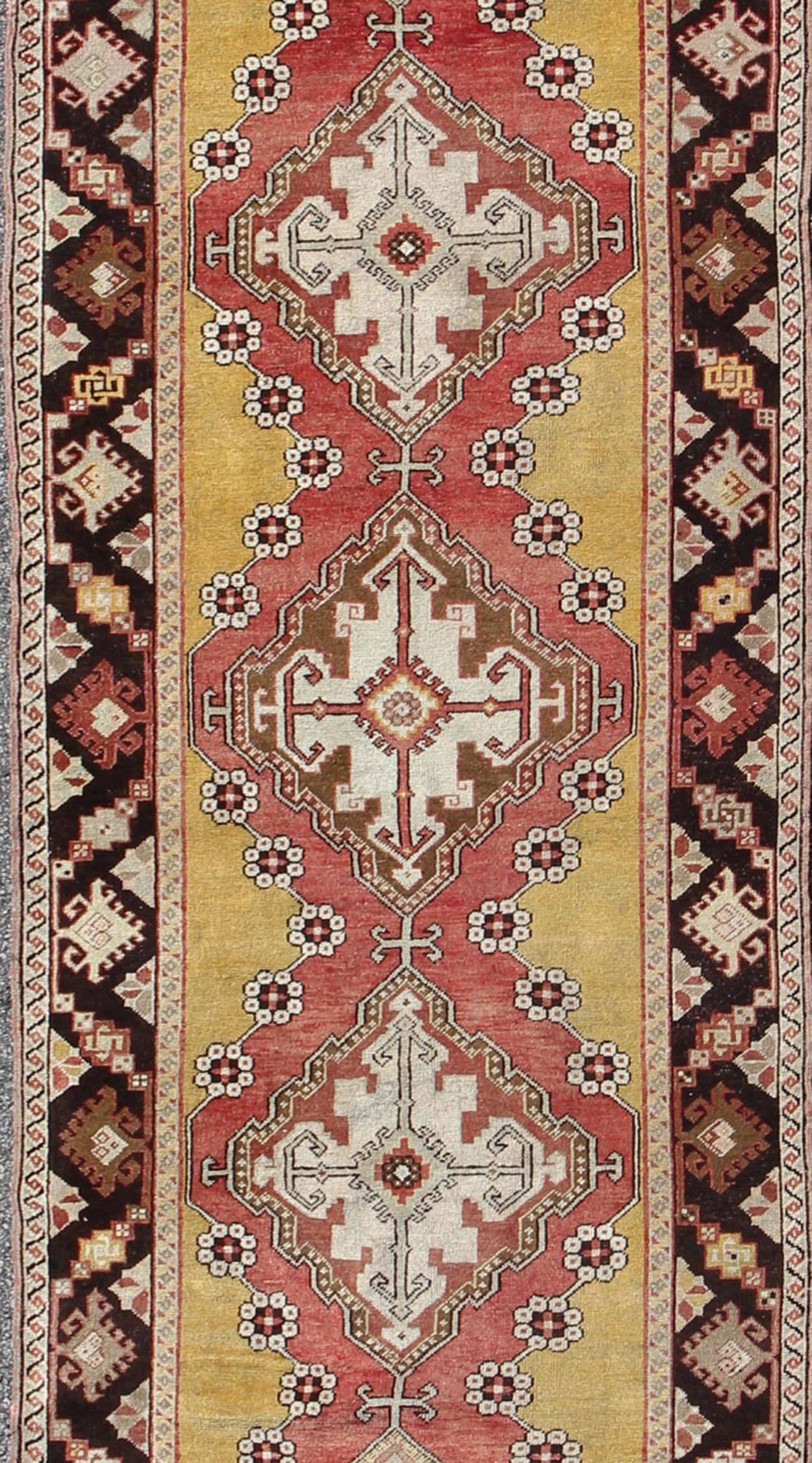 Hand-Knotted Antique Turkish Oushak Long Runner with Medallions in Brown and Goldish Yellow  For Sale