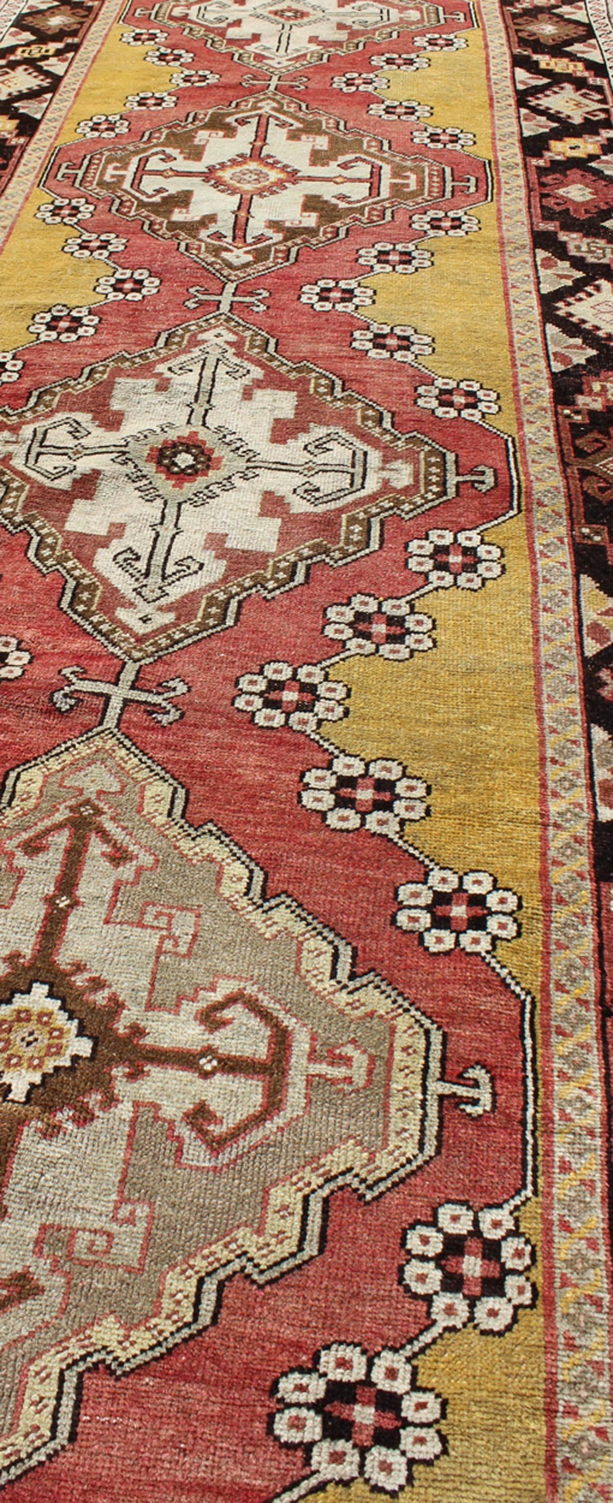 Early 20th Century Antique Turkish Oushak Long Runner with Medallions in Brown and Goldish Yellow  For Sale