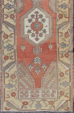 Vintage Turkish Oushak Runner with Brick Red Field and Ivory Medallions