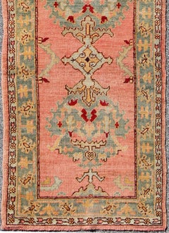 Antique Turkish Oushak Runner with Medallions in Coral Background & Green Border