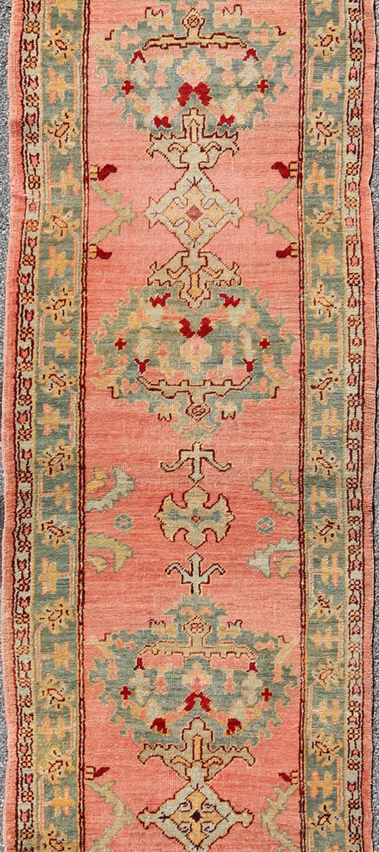Antique Turkish Oushak Runner with Medallions in Coral Background & Green Border In Excellent Condition For Sale In Atlanta, GA