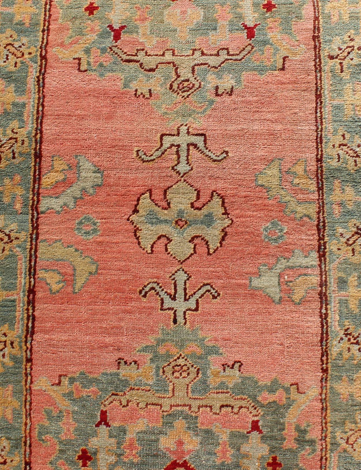 Antique Turkish Oushak Runner with Medallions in Coral Background & Green Border For Sale 1