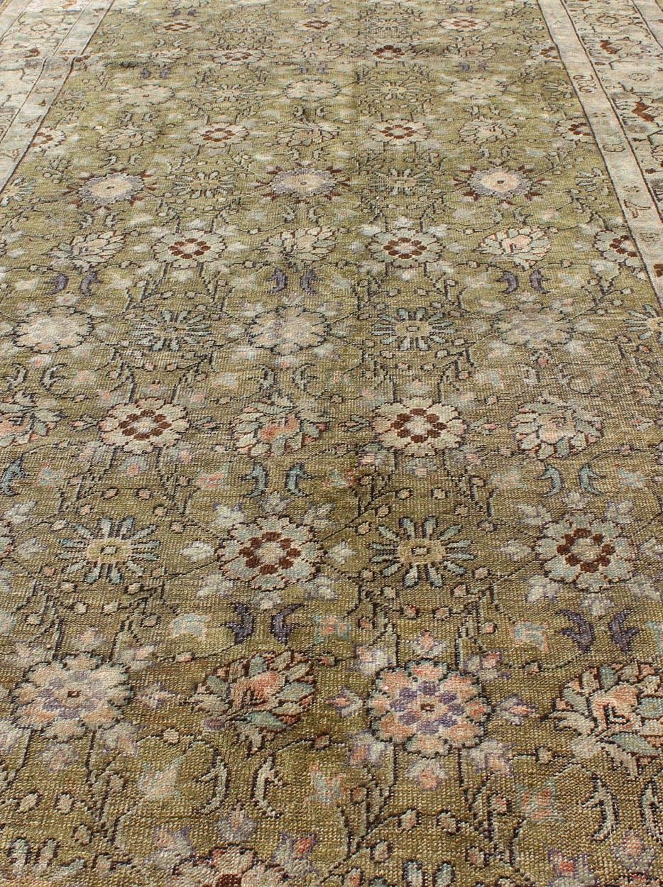 20th Century Green Background Antique Oushak Rug with Silver and Light Blue Border For Sale