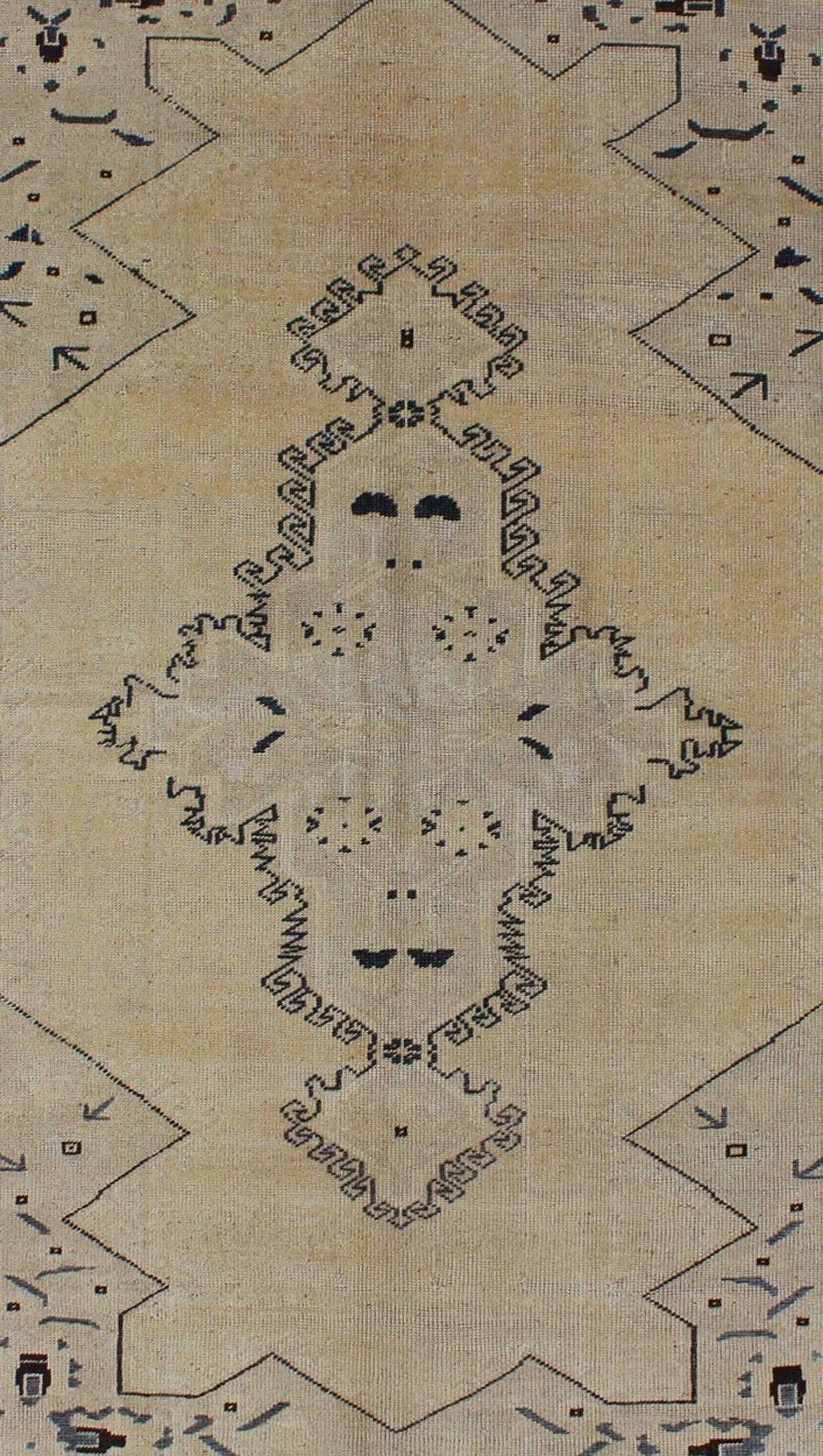 teal geometric rug