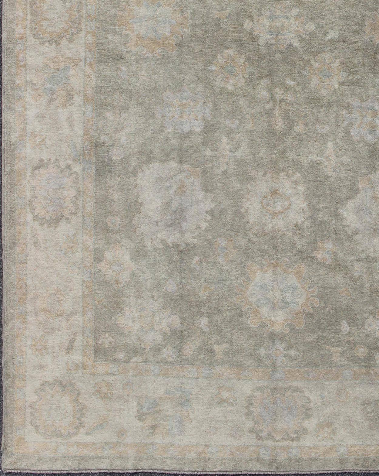 Large Turkish Oushak Rug with Large-Scale All-Over Blossom Design in Taupe, Pale Moss Green and Cream. 

 Large Oushak Rug From Turkey in Light Moss Green, cream & Taupe and touch of light blue colors. Keivan Woven Arts/  rug EN-637, country of