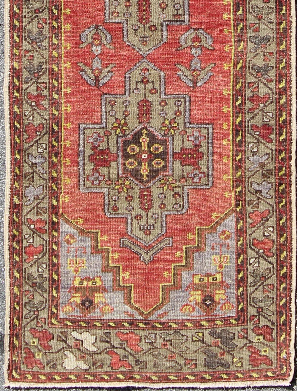 Cross Medallions Vintage Oushak Runner from Turkey in Burnt Orange and Olive, rug en-973, country of origin / type: Turkey / Oushak, circa 1930

This vintage Turkish Oushak runner (circa 1930) features a unique blend of colors and an intricately