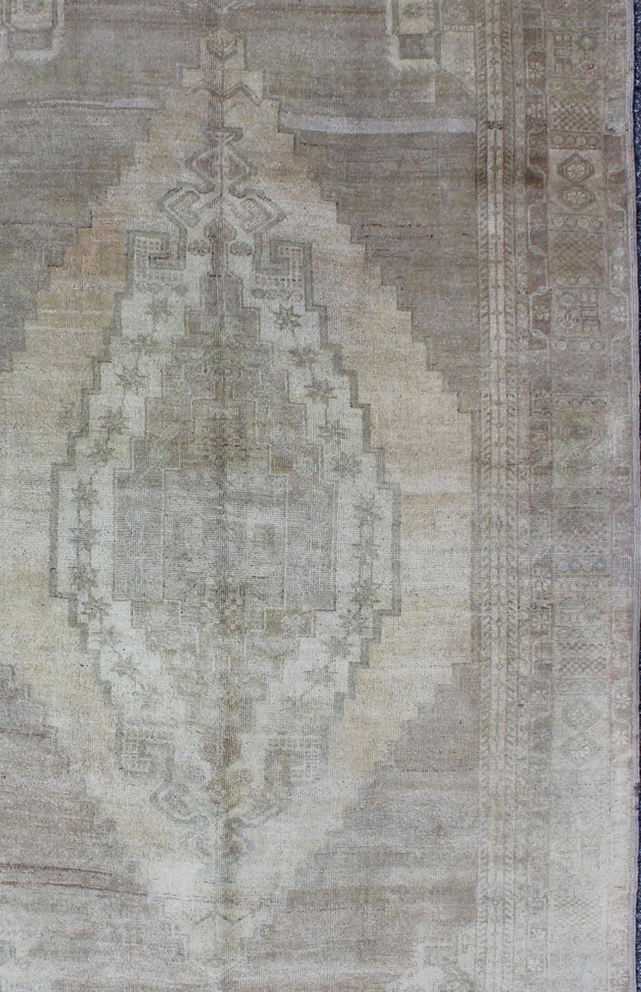 Hand-Knotted Shades of Gray Oushak Vintage Rug from Turkey with Layered Medallion For Sale