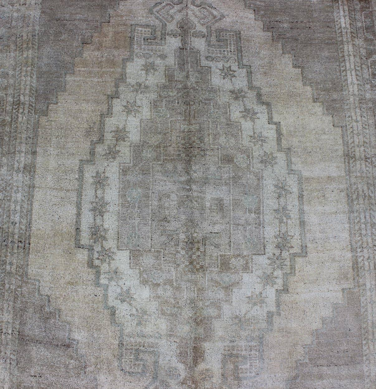 Mid-20th Century Shades of Gray Oushak Vintage Rug from Turkey with Layered Medallion For Sale
