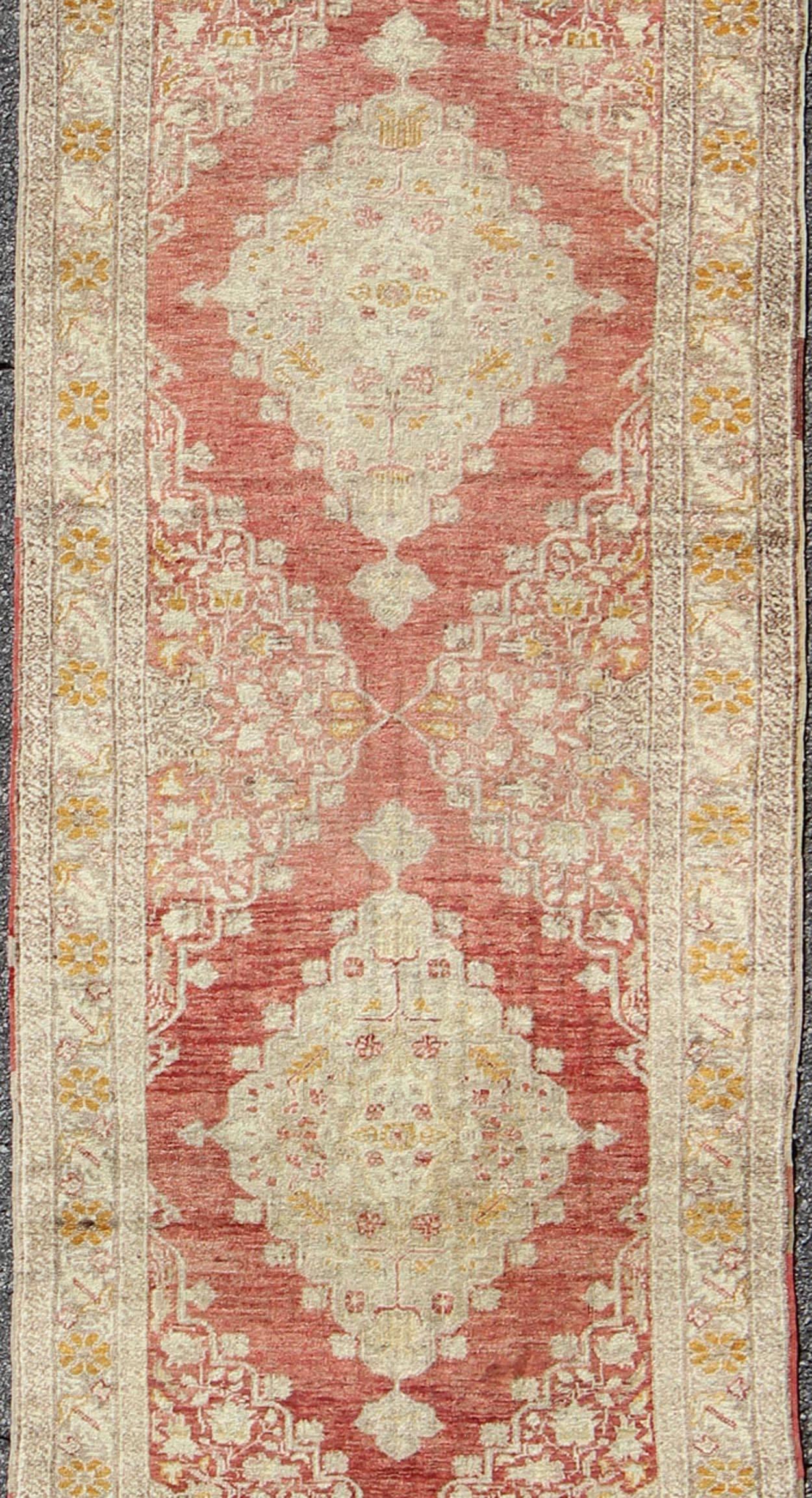 Antique Turkish Oushak Runner with Red Background and Ivory/Cream Medallions In Excellent Condition For Sale In Atlanta, GA