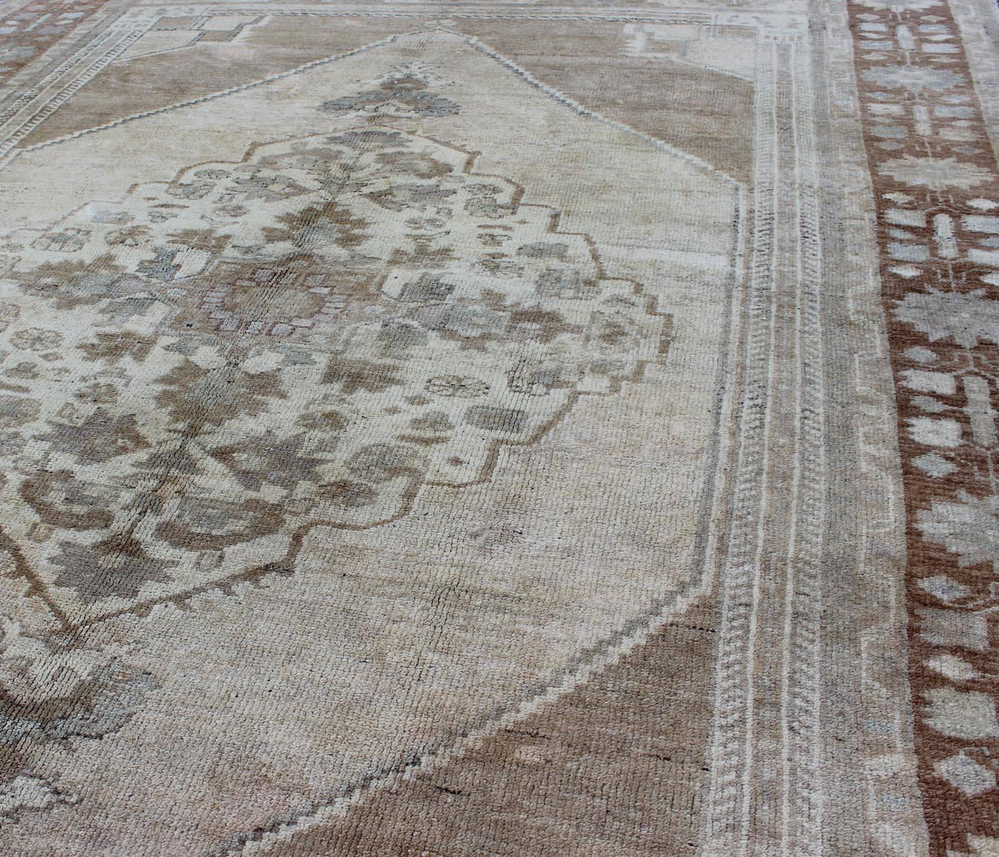 Mid-20th Century Vintage Turkish Oushak Rug with Layered Floral Medallion in Ivory, Gray, Brown