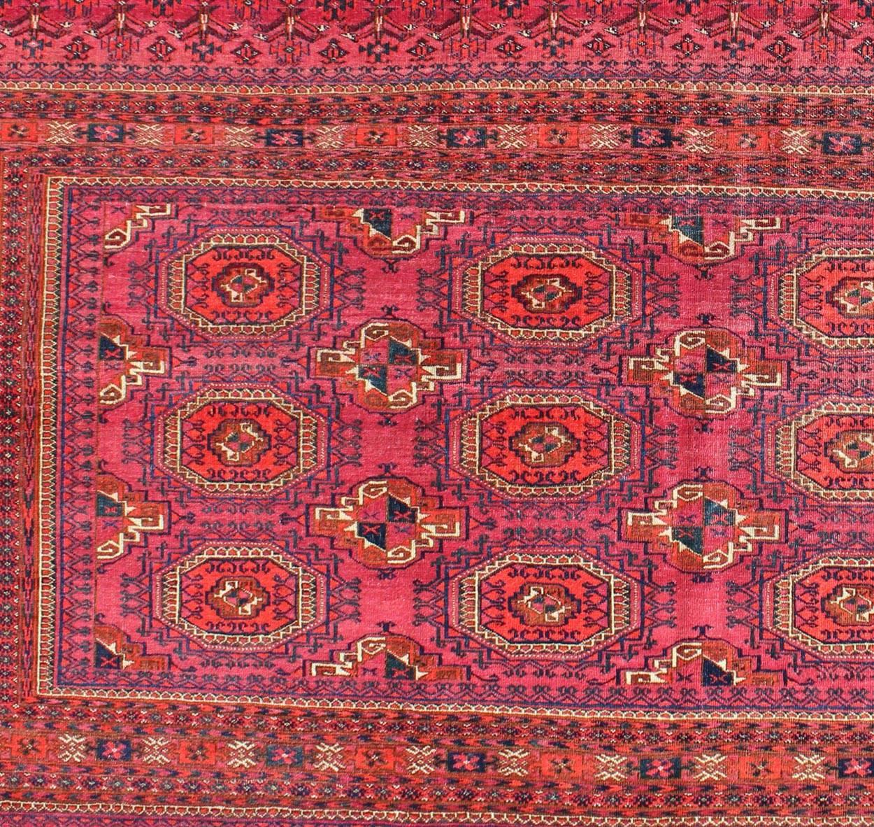 Tribal Antique Turkoman Tekke Rug with Repeating Medallion Design in Fuchsia